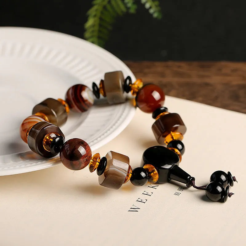 Natural agate bracelet with sardonyx, white, red, and black agate beads in geometric ethnic design