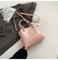 Women's medium-soft PU messenger bag in bucket shape with pendant, black, white, wine red, and pink options