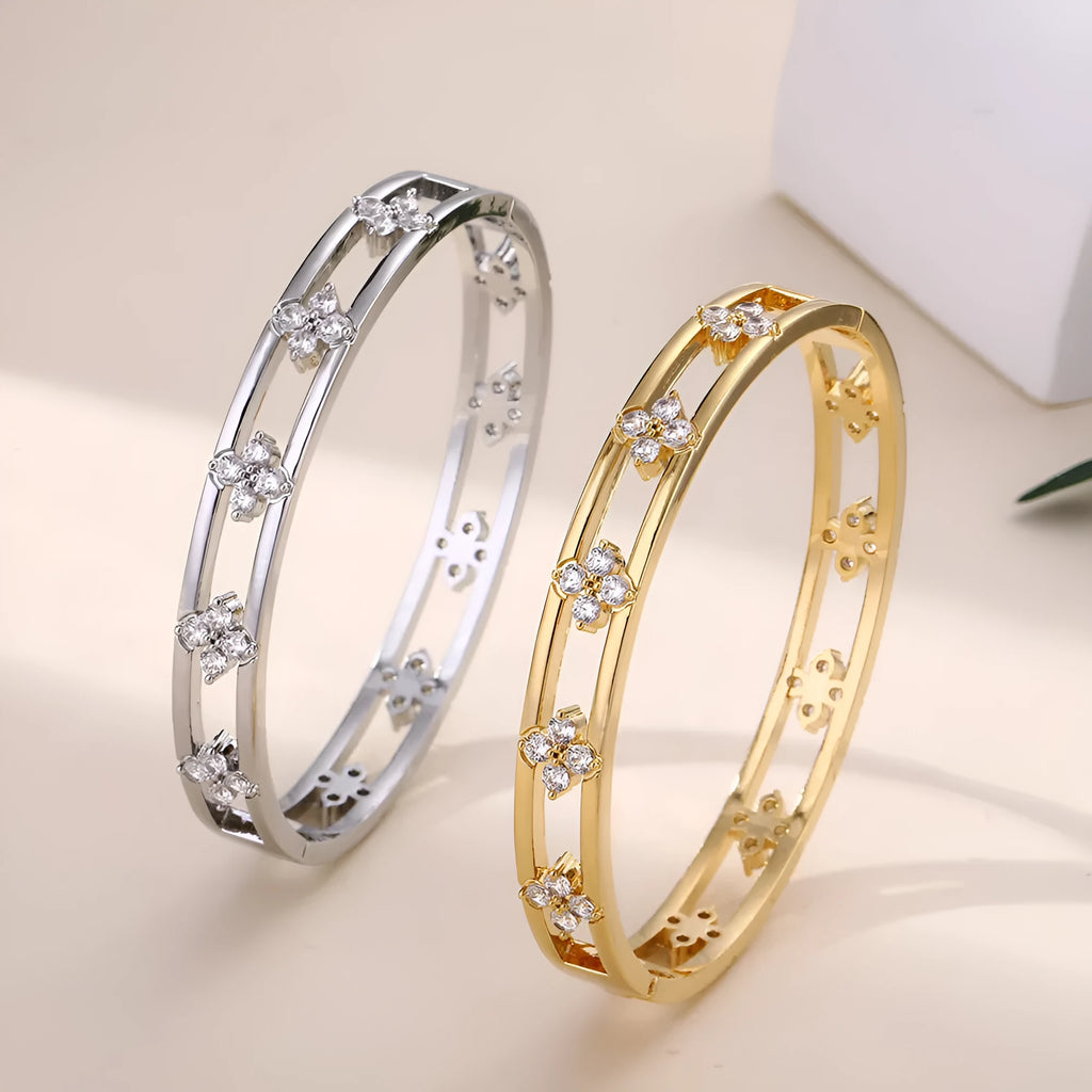 Women's hollow bracelet with zircon stones and four-leaf clover design in gold or silver colour
