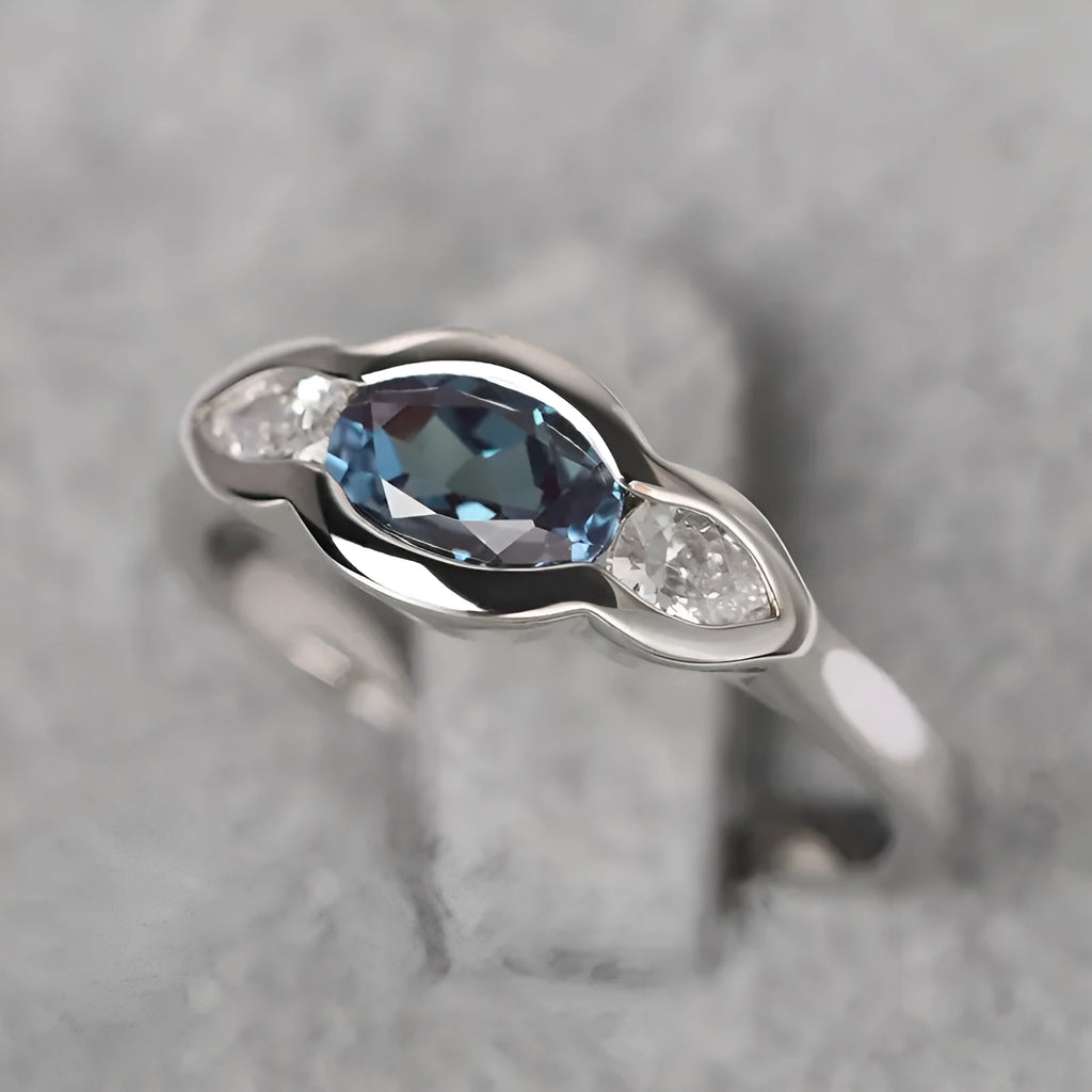 Women's geometric ellipse ring with zircon stones in white gold colour on copper band