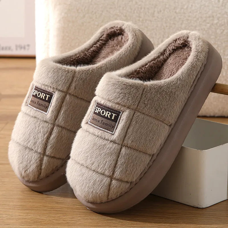 Men's grey and brown plaid winter slippers with a thick sole and rabbit hair trim.