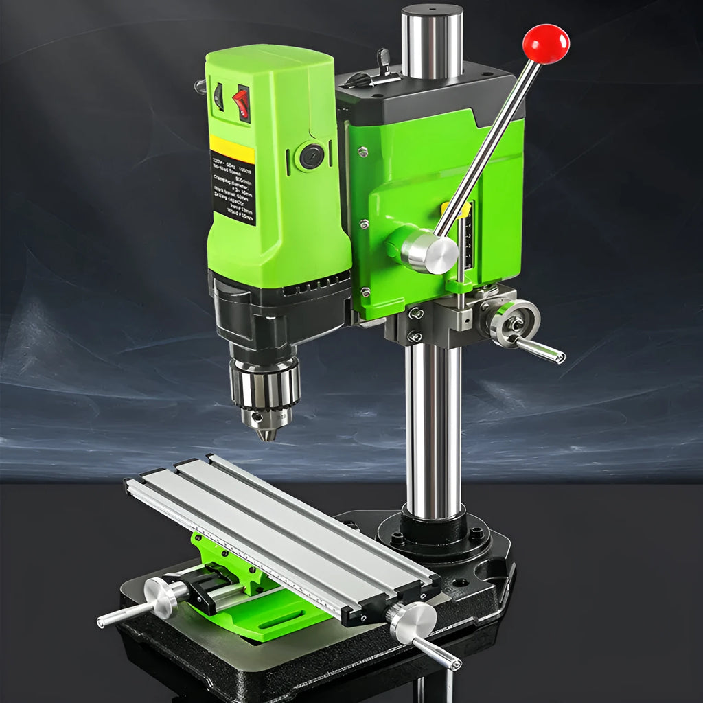 Mini bench drill and milling machine with heavy duty bench pliers on a workbench.