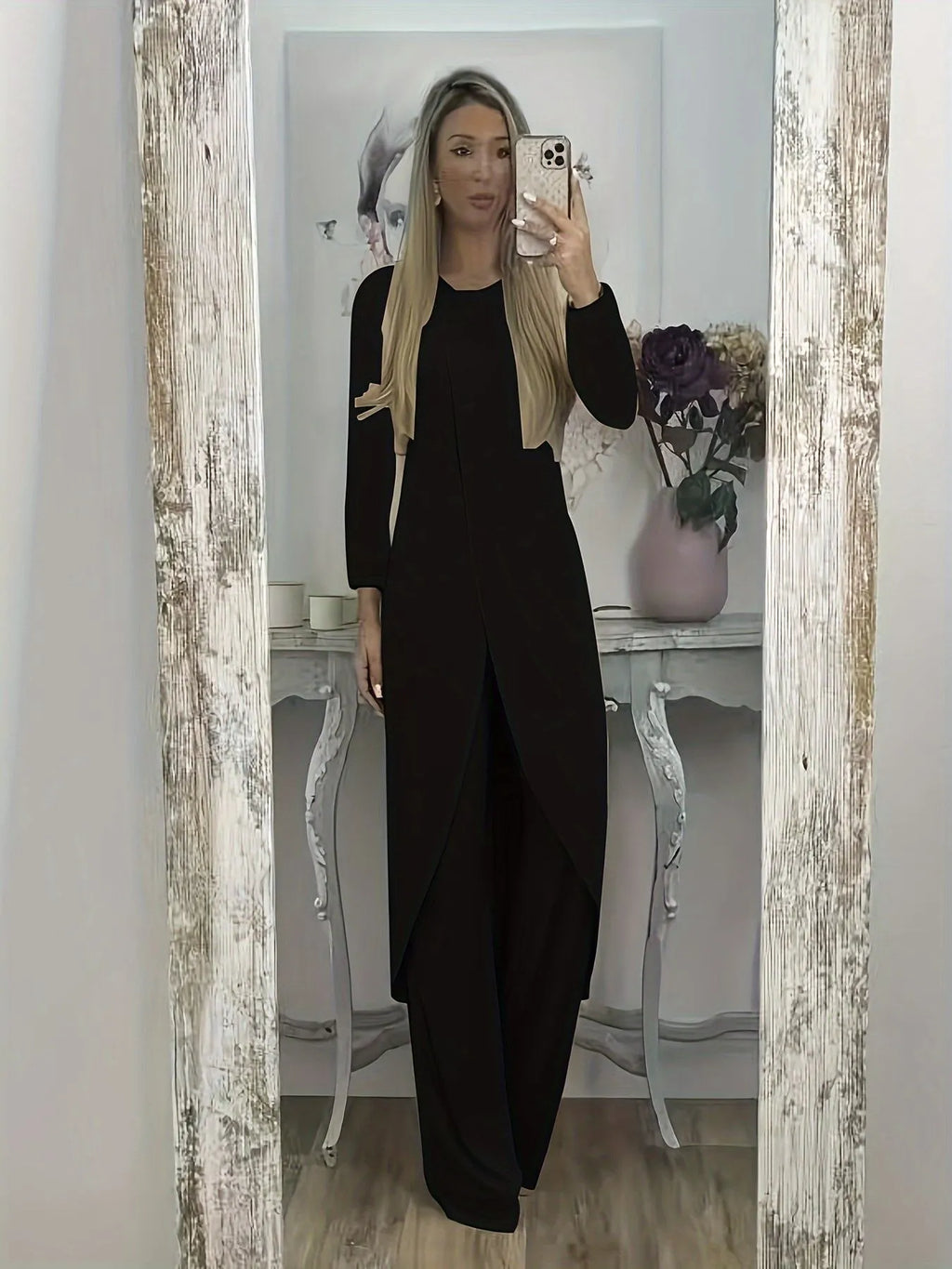 Women's casual two-piece lounge set showing long sleeve top and trousers in loose fit