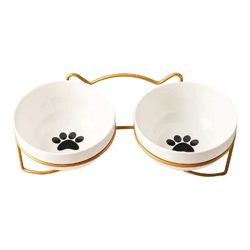 Ceramic cat bowl in an iron frame, showing cat paw print and fishbone pattern options