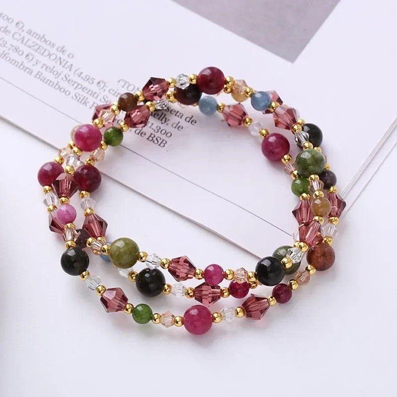 Handmade women's adjustable bracelet with three amethyst, strawberry quartz, or tourmaline crystal stones.
