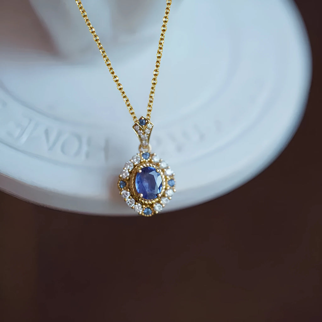 Yellow gold colour copper necklace with mixed gem inlay pendant on a box chain.