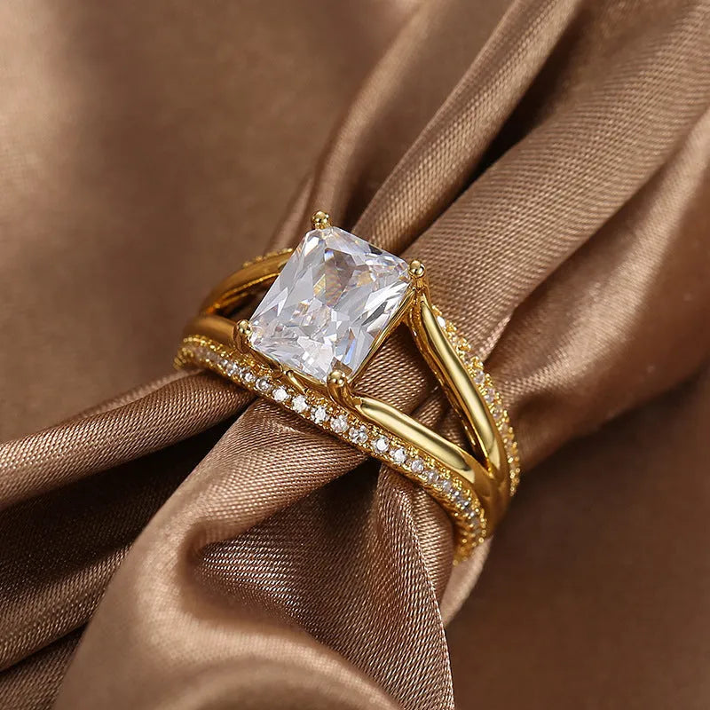 Geometric women's ring with square zircon stone and gold electroplated finish on copper