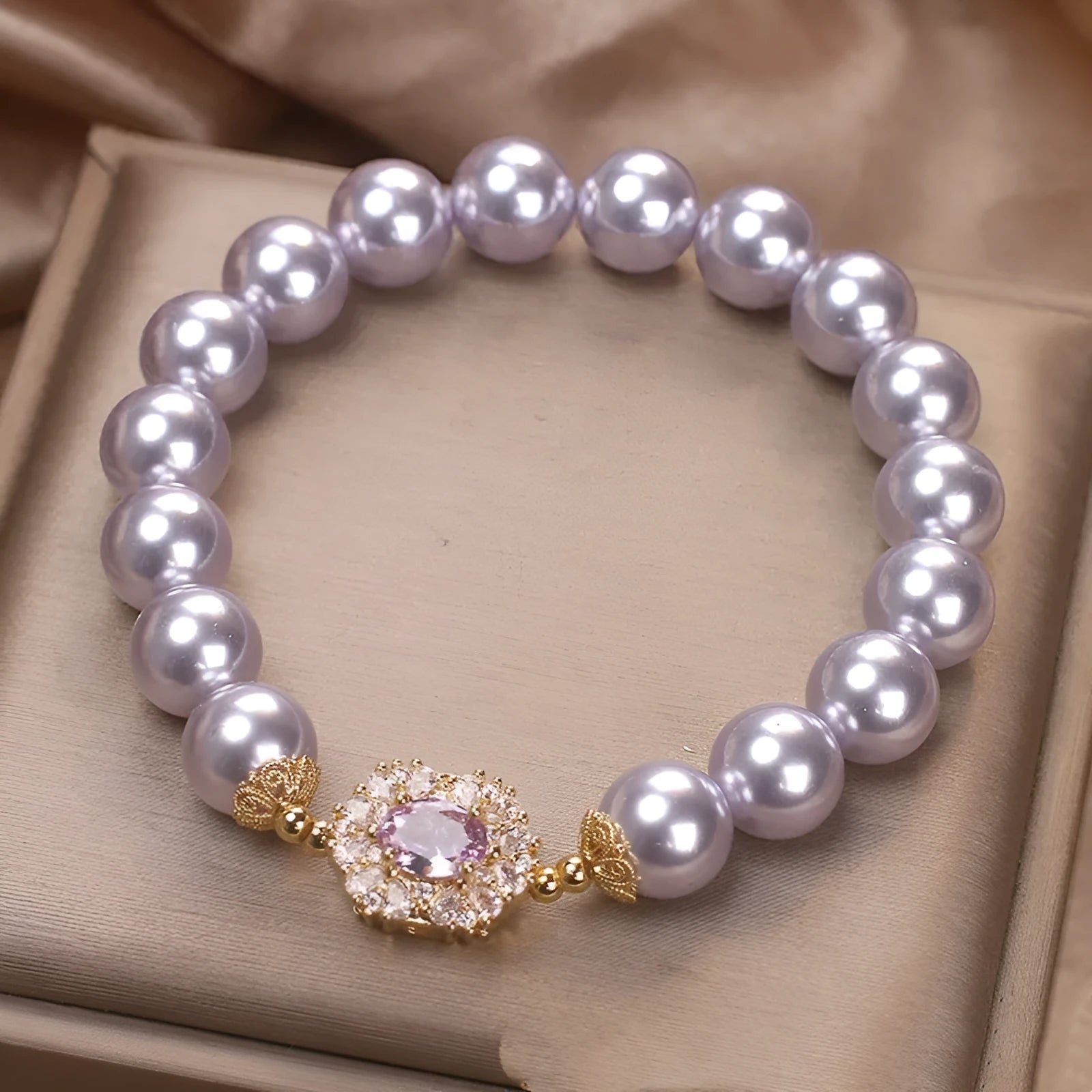 Dreamy purple zircon pearl bracelet with diamond flower charm on wrist