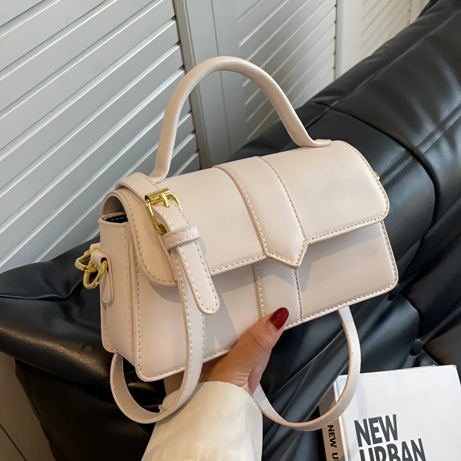 Women's PU leather messenger bag in neutral colour with file organiser interior and sandwich pocket