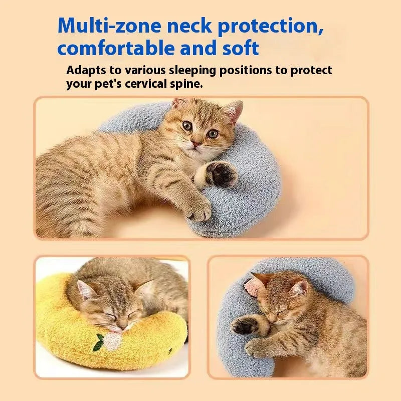 Blue and yellow question mark shaped cat bed with a U-shaped pillow for neck support on a wooden floor.