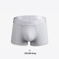 Men's solid colour cotton boxer shorts in black, shown in a loose fit style.