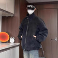 Men's black tie-dye PU leather jacket with stand collar and side pockets.