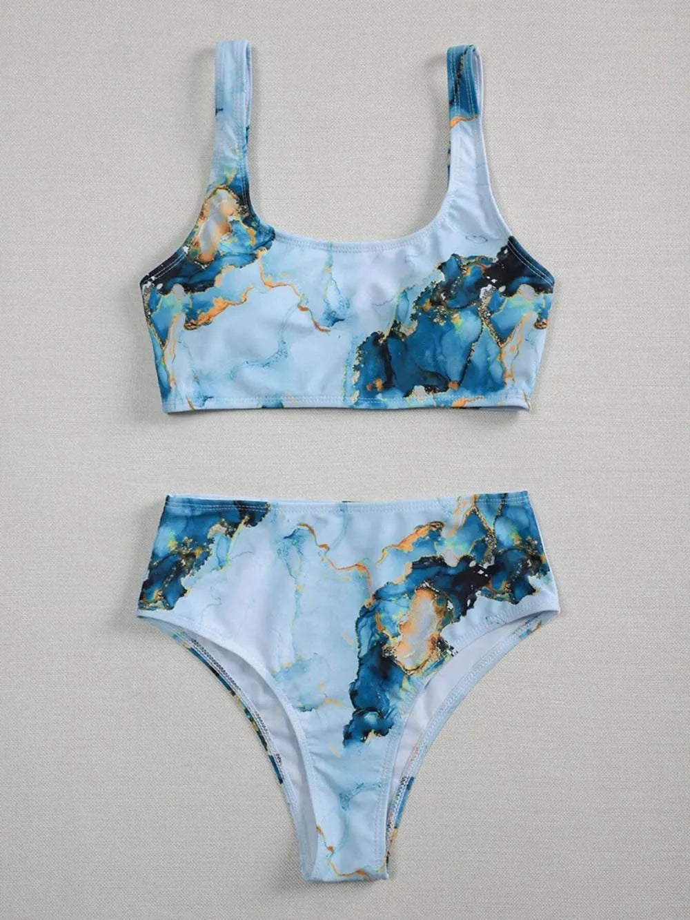 Women's high waist marble print bikini swimwear in a U-neck design.