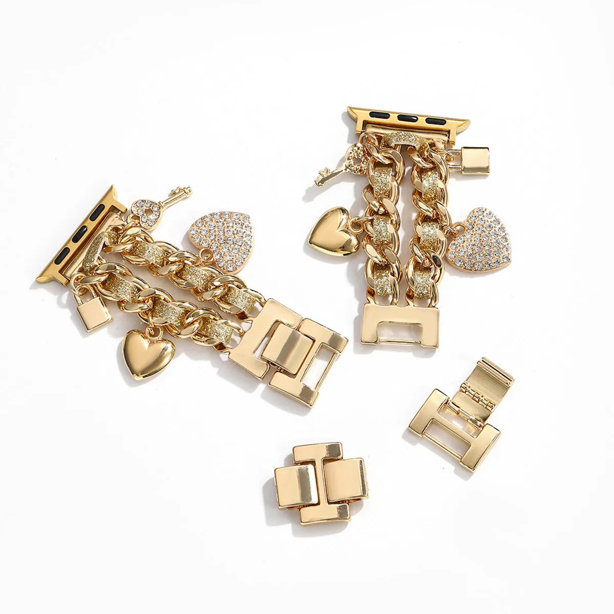 Golden heart pendant ladies watch strap in gold alloy on display with multiple size options visible