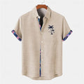 Linen short-sleeve top for teenagers with a loose fit and an ocean fish pattern on the lapel.