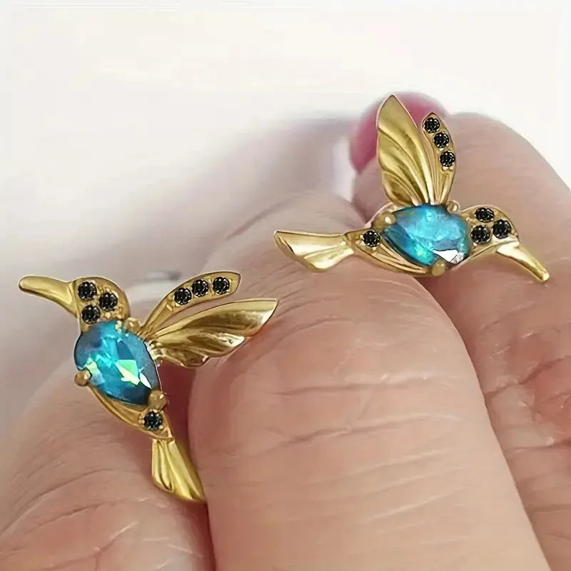 Bird hanging earrings for women in long style with mixed zirconium wings on electroplated alloy.