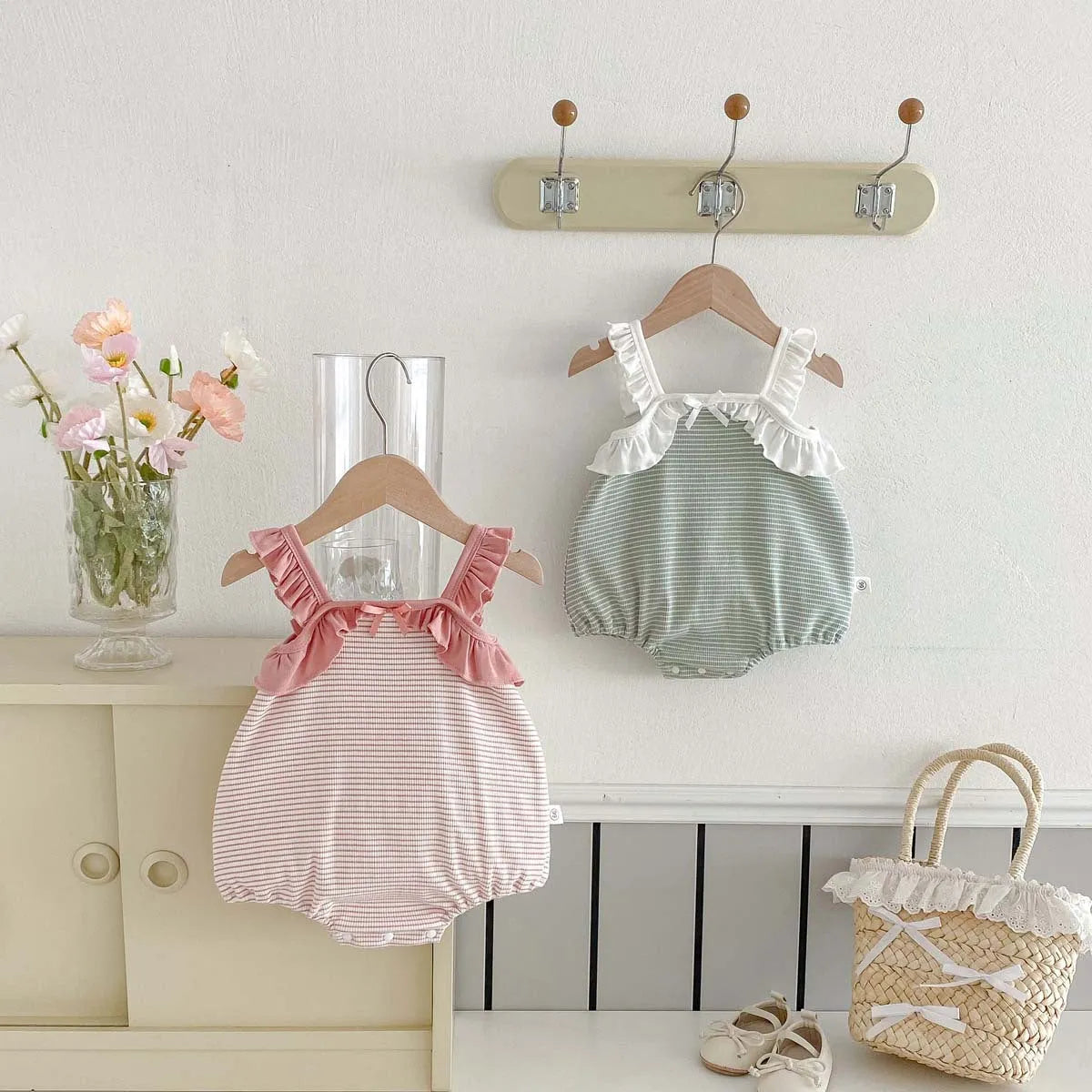 Girls light green striped sleeveless cotton jumpsuit for 66-90cm height with ruffle neckline