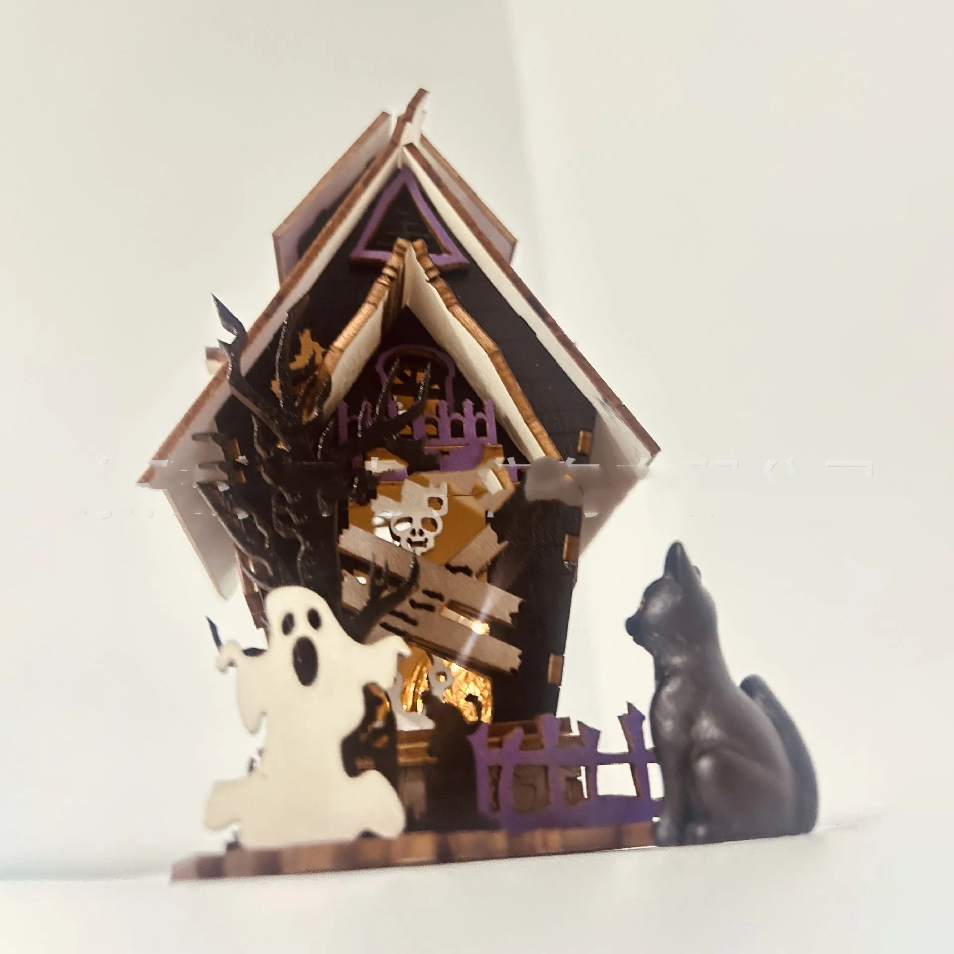 DIY wooden Halloween haunted house decoration kit with luminous design, shown with dimensions 14cm wide by 19cm high.