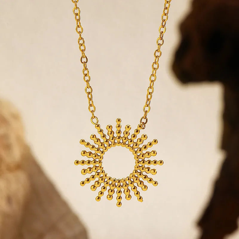 Sunflower Series gold tone geometric chain necklace and bracelet set for women.
