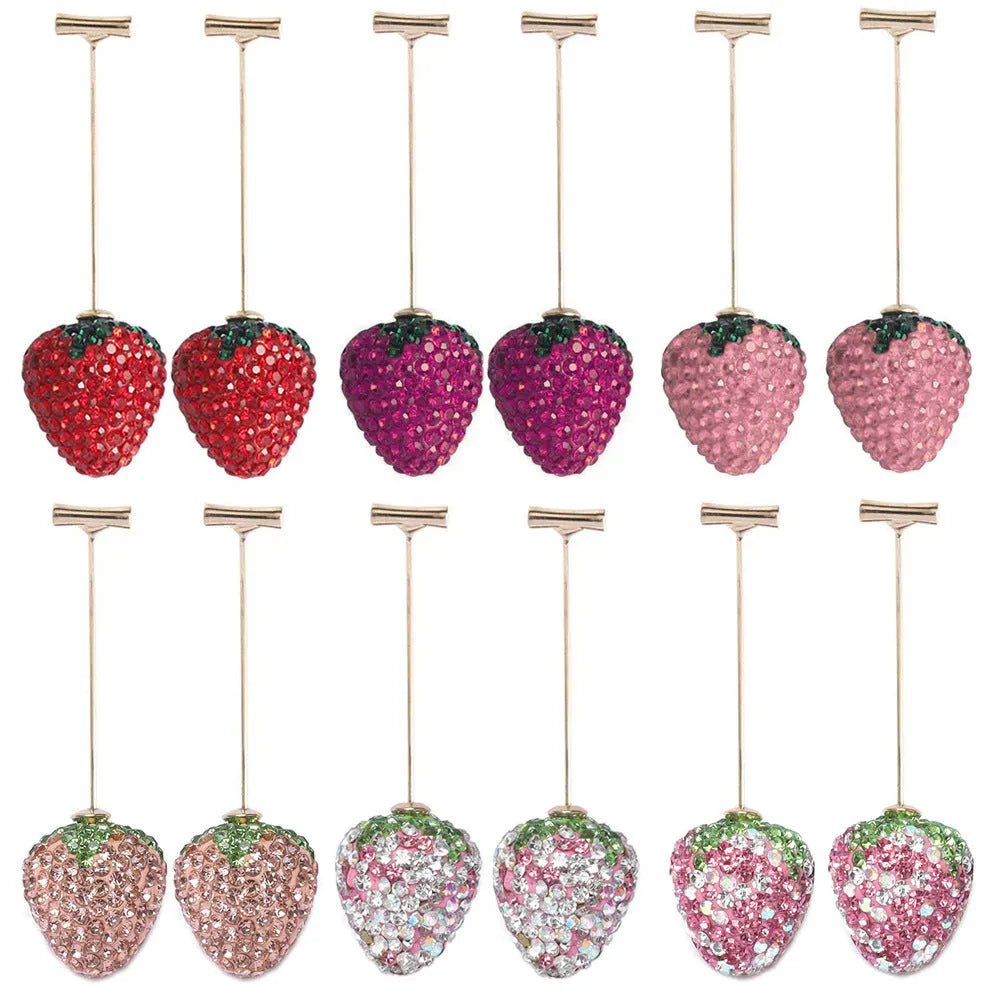Geometric red strawberry stud earrings with spot drill texture on a zinc alloy post.