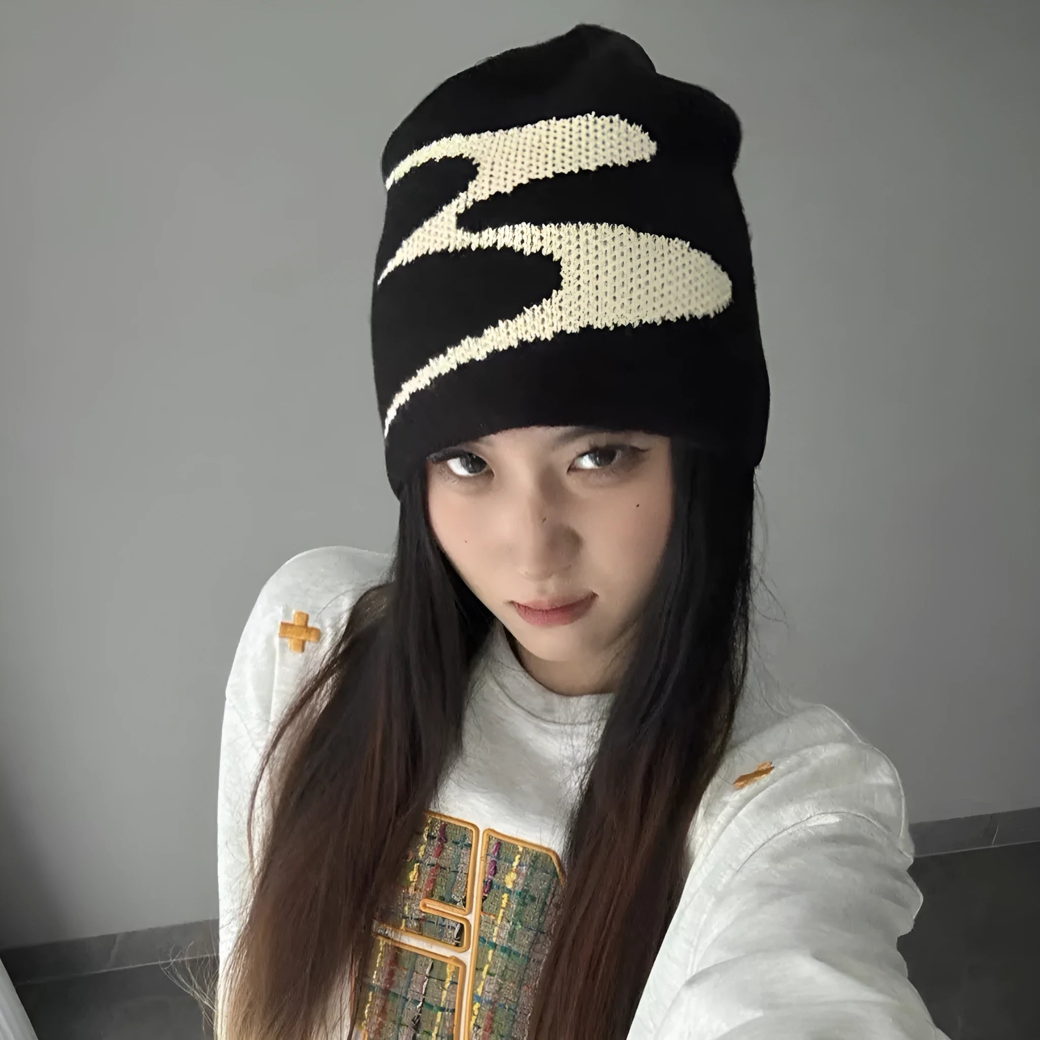 Acrylic thermal beanie hat in black colour on head model