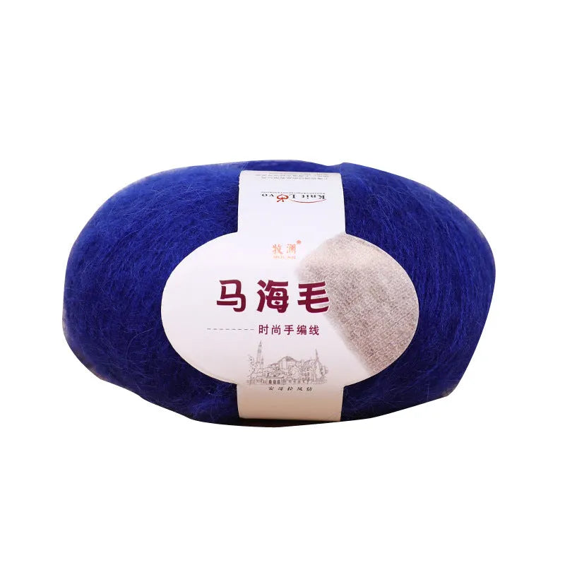 Ball of mohair yarn for DIY scarf knitting in one of 34 colours, including white, pink, blue, and green.