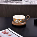 Antique style ceramic coffee cup and saucer set in black or orange, 210ml capacity.