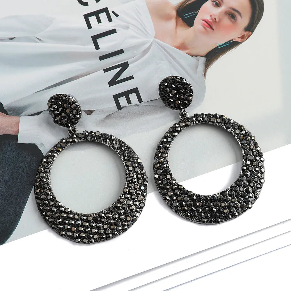Colourful metal alloy round pendant earrings with cartoon diamond design for women.