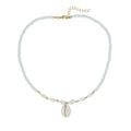 White conch shell necklace with mother-of-pearl pendant on electroplated chain with bead accents