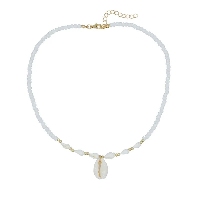 White conch shell necklace with mother-of-pearl pendant on electroplated chain with bead accents