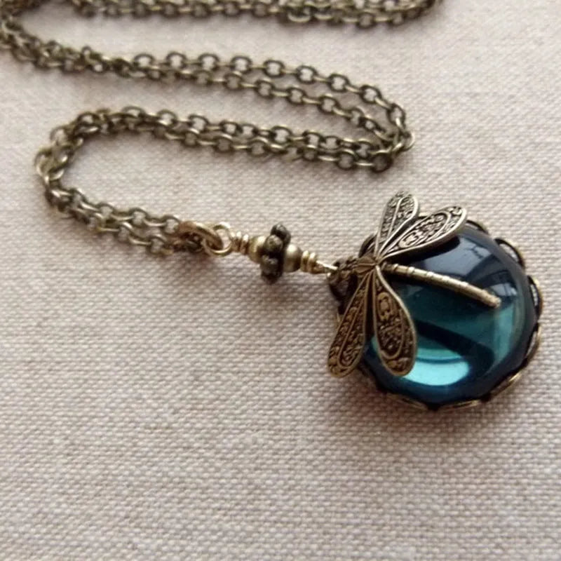 Yellow vintage bronze dragonfly pendant necklace on silver chain