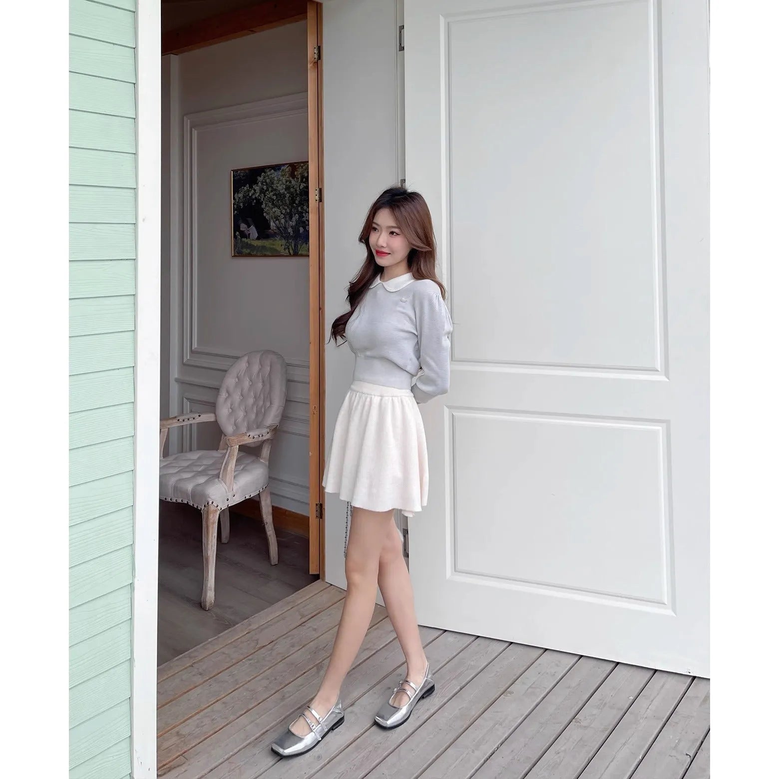 Women's silver leather Mary Jane ballet pumps with cross buckle strap and flat low heel.