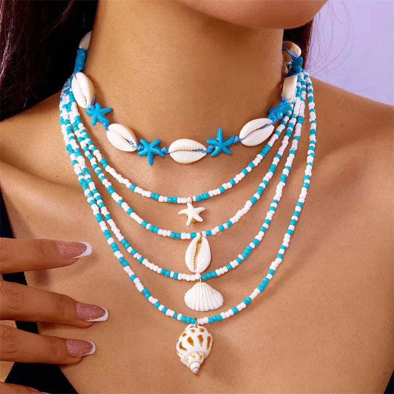 Blue multi-layer women's necklace with starfish shell beads and adjustable chain