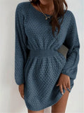 Blue women's knitted dress with hand-crocheted floral details and a fitted waist.