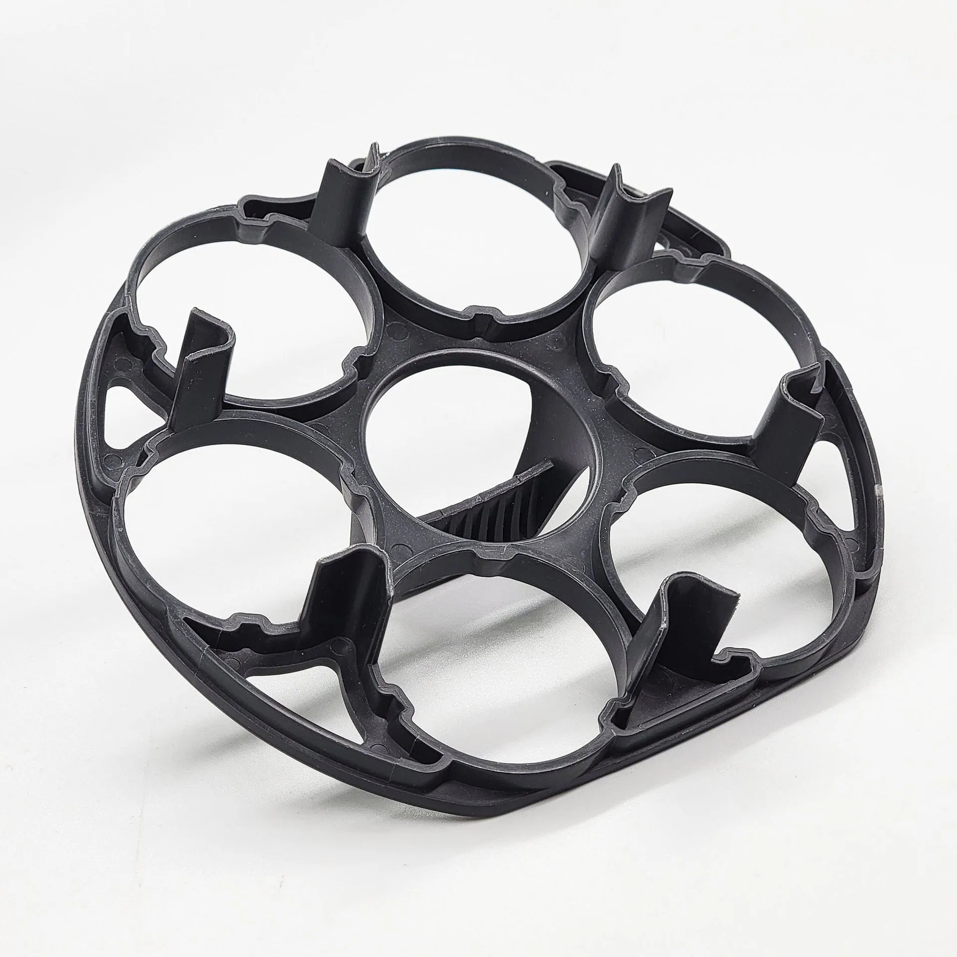 Black plastic egg holder rack measuring 13.8 by 12.6 cm for kitchen organisation