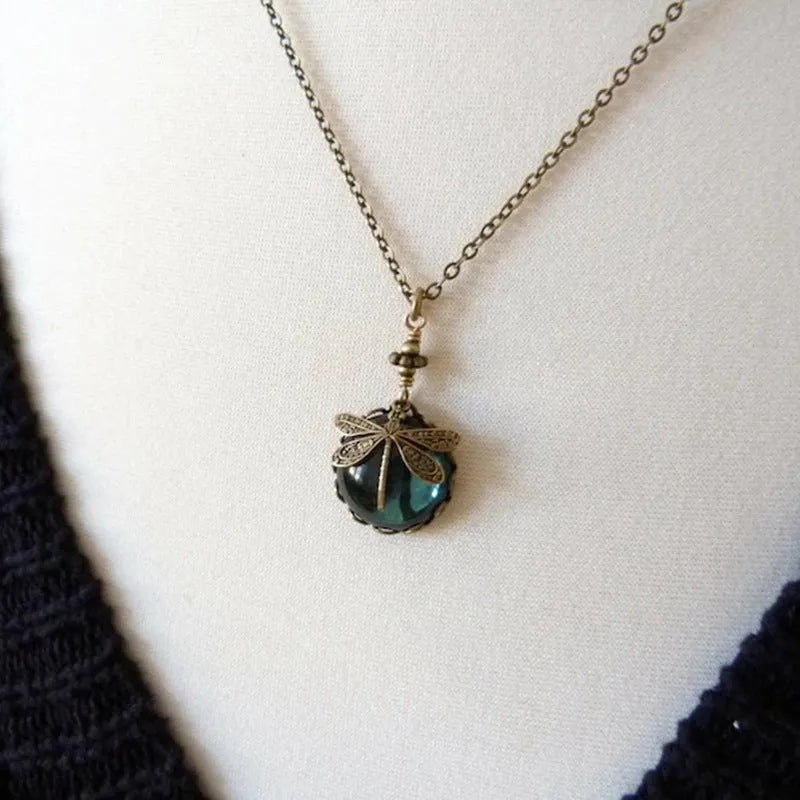 Yellow vintage bronze dragonfly pendant necklace on silver chain