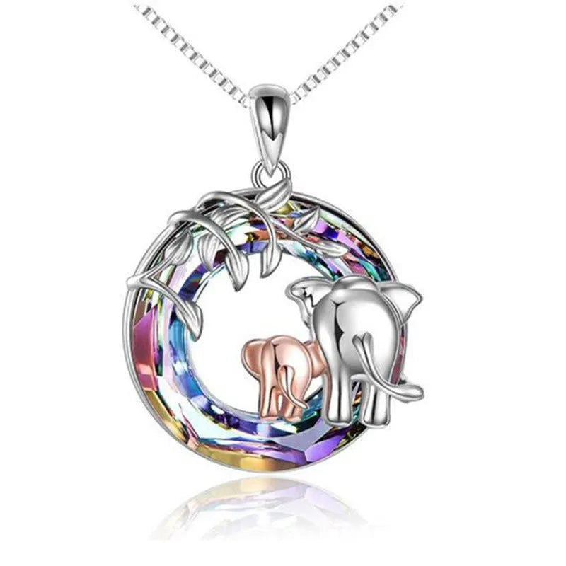 Platinum coloured women's necklace with geometric Saturn pendant on adjustable 51cm-80cm chain.