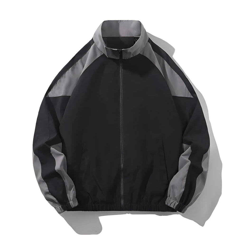 Men's black casual jacket with contrast stitching and side seam pockets, shown on a model.