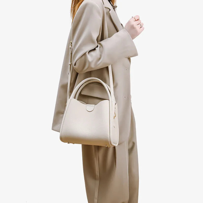 Genuine leather cylindrical vegetable basket handbag in selected colour with sewing thread detailing