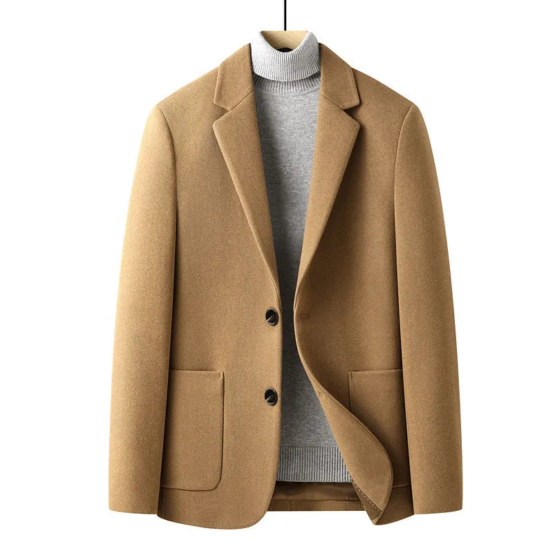 Men's slim-fit grey wool suit jacket with a notch lapel, shown on a hanger.