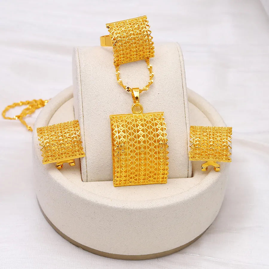 Golden copper bridal jewellery set showing necklace, earrings and ring combination for wedding accessories