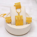 Golden copper bridal jewellery set showing necklace, earrings and ring combination for wedding accessories