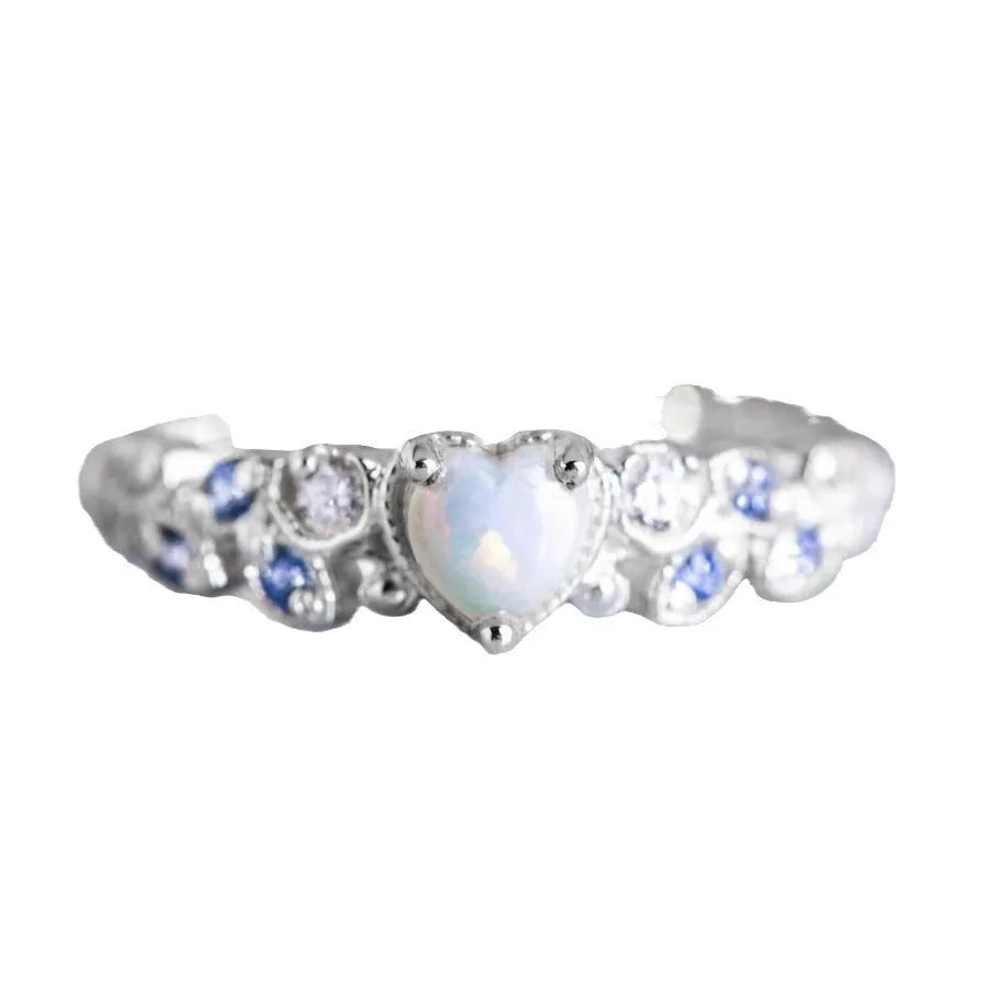White alloy peach heart-shaped women's ring with floral and ocean opal detailing.
