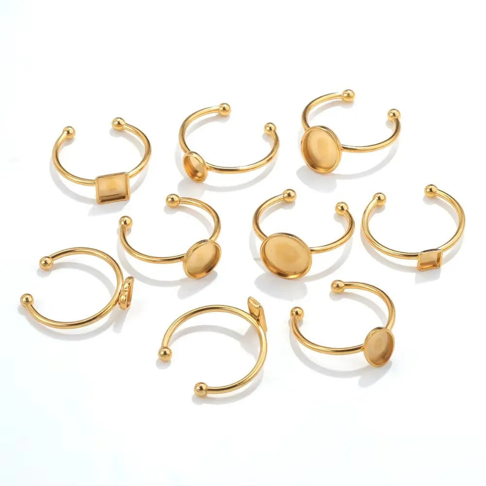 Golden-toned stainless steel ring holder with totem pattern and multiple shape options for jewellery organisation