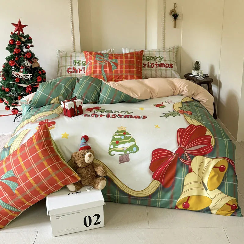 Christmas cartoon character bedding set with duvet cover, fitted sheet and pillowcases laid on a bed