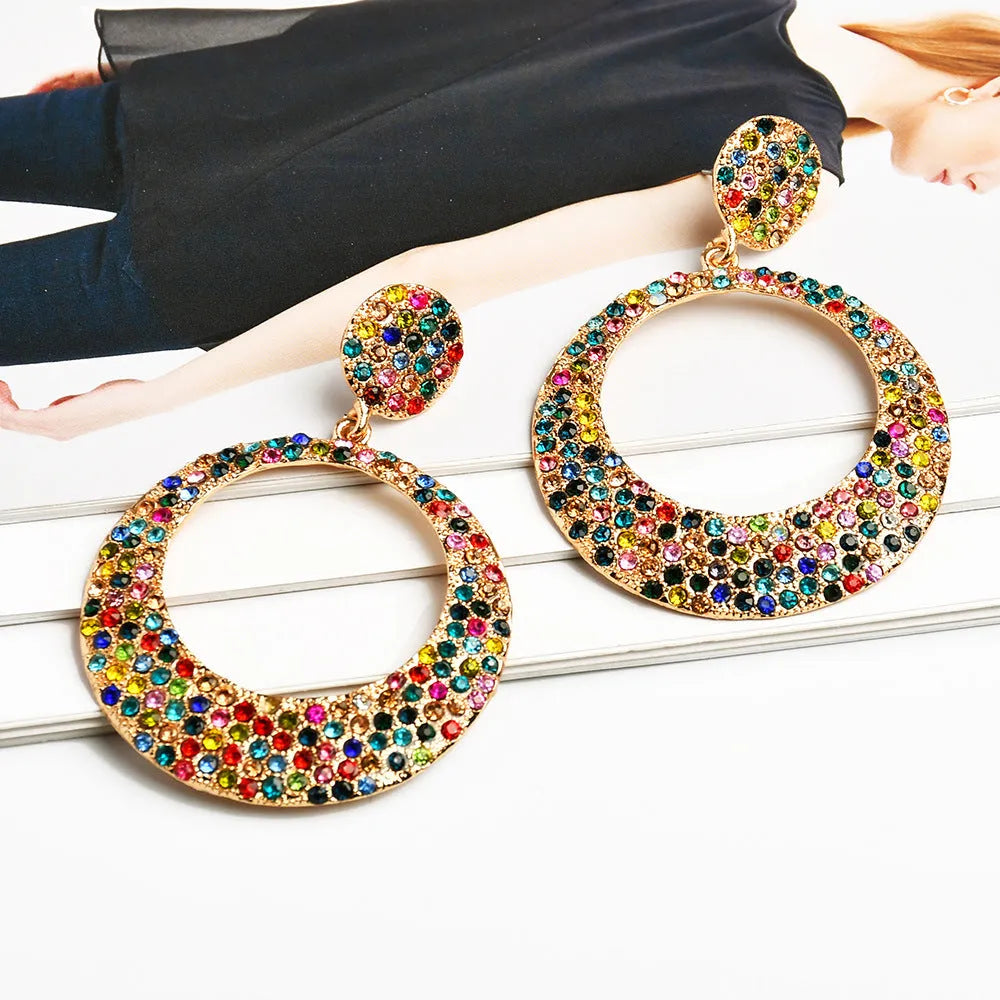 Colourful metal alloy round pendant earrings with cartoon diamond design for women.