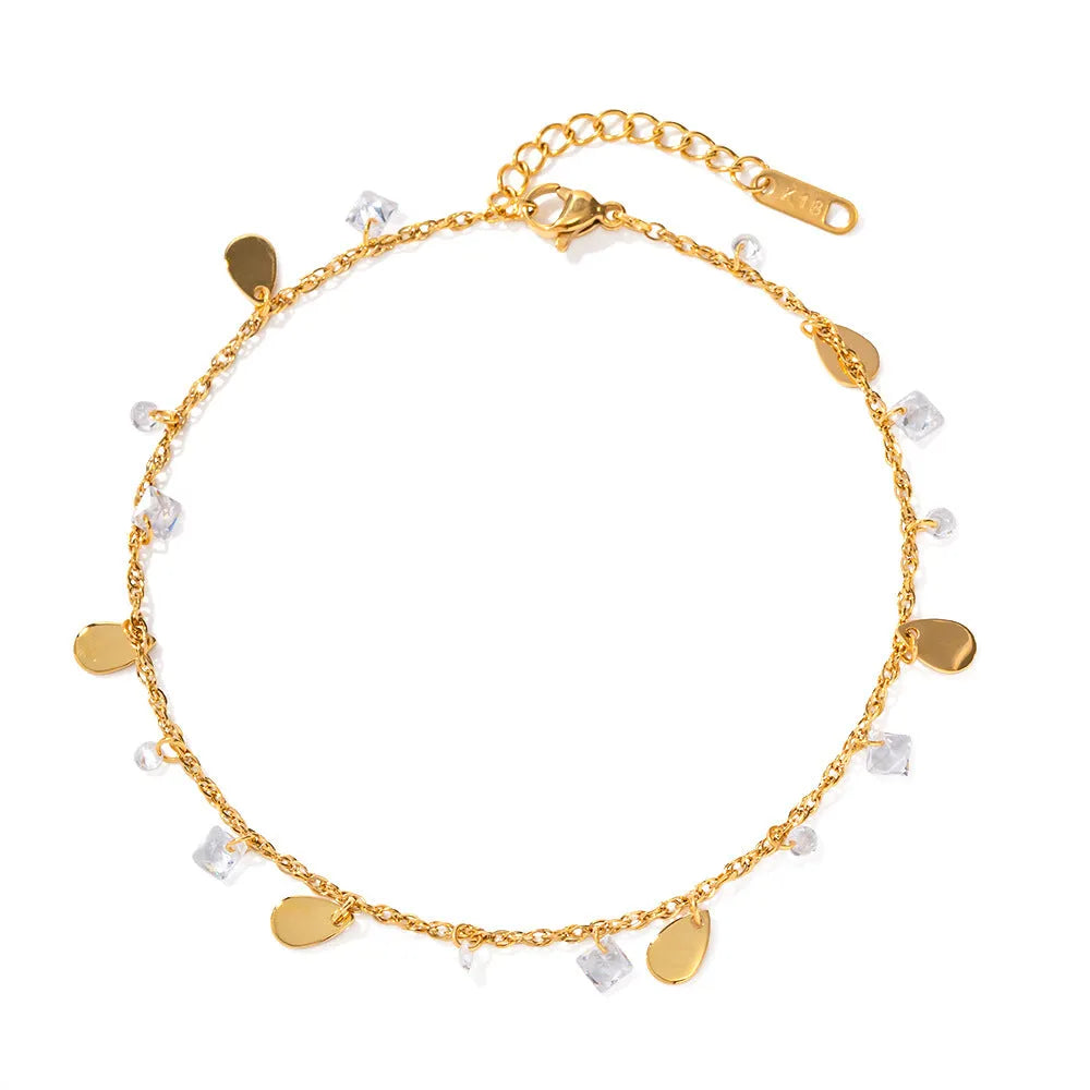 Stainless steel women's anklet with a geometric water drop tassel pendant on an adjustable chain.