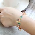 Women's handmade bracelet with imitation pearls and glass beads in six colour variations