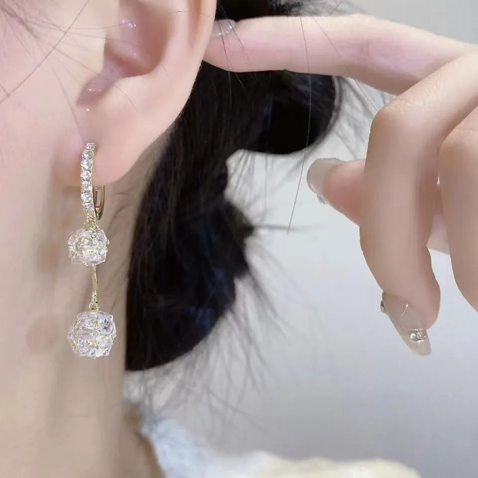 Silver confession balloon tassel earrings with rhinestone balls and drop shape design