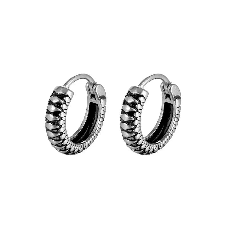 Geometric retro twist stainless steel earrings with circular sports style element in silver